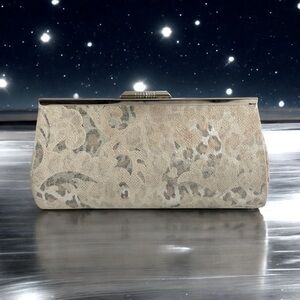 Silver Floral and 
Leopard Print Long Framed
Clutch 9.5”W x 4.5”H
